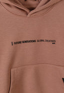 Close-up of cognac-colored boys hooded sweatshirt with black printed inspirational text and front pocket detail.