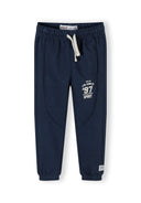 Navy boys' joggers with elasticated waistband and logo print, front view.