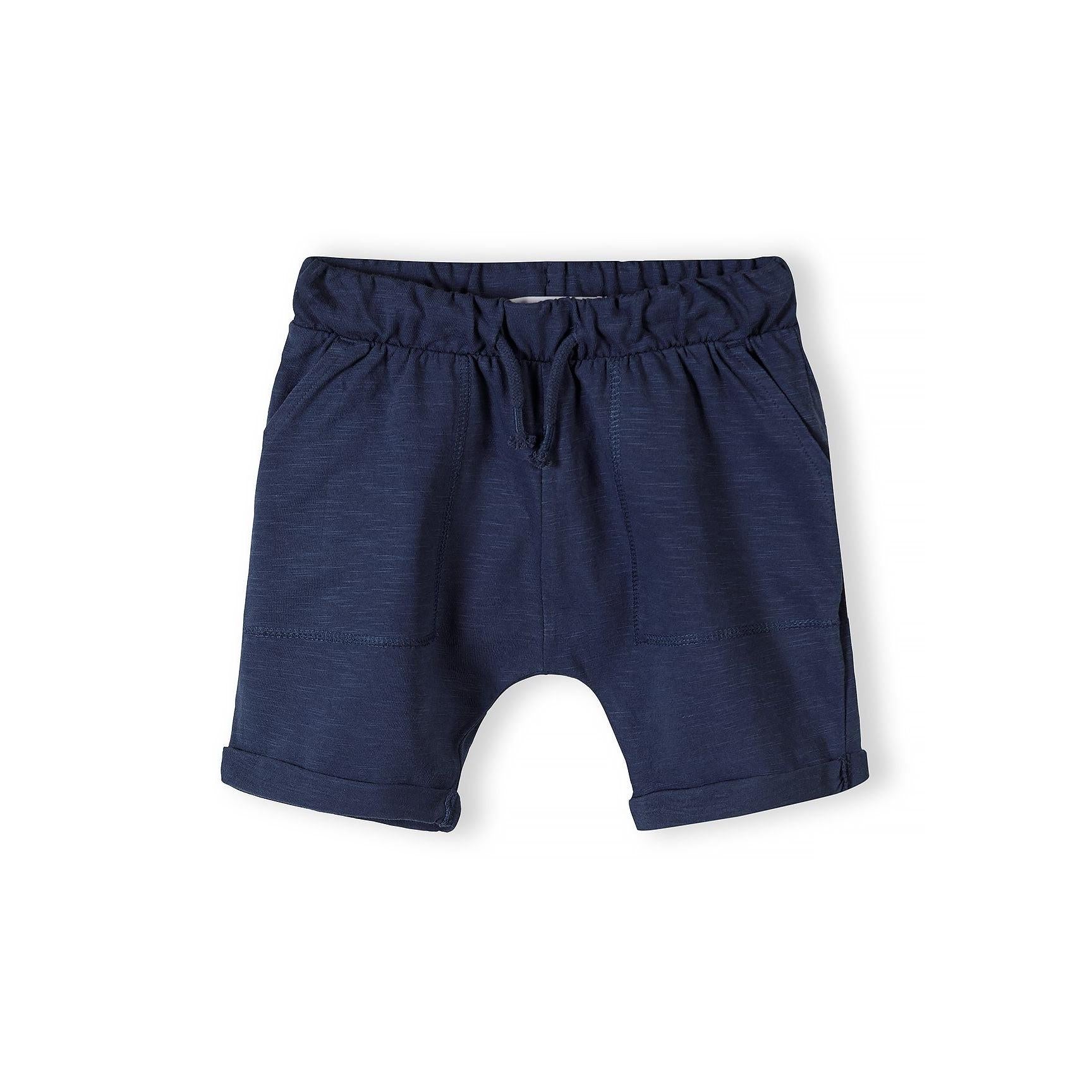 Single camel colored cotton slub jersey shorts laid flat showing elasticated waistband with drawstring and side pockets