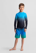Boy wearing a blue gradient close-fitting rash top and matching shorts showcasing modern kids fashion design.