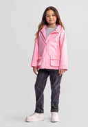 Young girl wearing a pink waterproof jacket with striped hood detail and black jeans in a studio setting