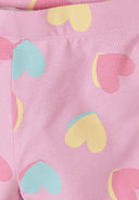 Close-up of soft cotton cycle shorts with pastel heart print design for kids and babies.