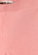 Close-up of soft pastel pink cotton stretch fabric with clean stitched waistband design for kids shorts