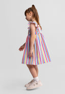 Young girl wearing a colorful striped dress with fitted volant sleeves, showcasing a playful kids fashion design