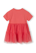 Back view of a girls' orange jersey dress with multilayer tulle skirt and elasticated waist.