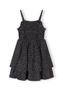 Girls floral summer dress, black, front view with adjustable straps and ruched bodice.