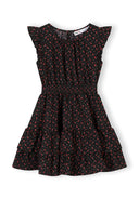 Girls black floral a-line dress with frill sleeves, front view.