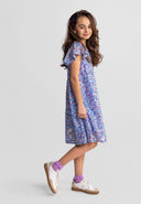 Young girl wearing a blue sequin dress with flared sleeves and a round neck, showcasing a stylish kids fashion design.