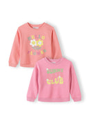 Two girls sweatshirts in coral and pink with cheerful floral-themed graphic designs and colorful lettering