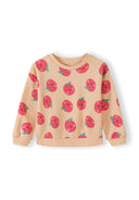 Apricot-colored girls sweatshirt with playful apple print design, soft fabric, and ribbed cuffs for kids aged 3 months to 7 years.