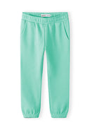 Turquoise kids joggers with elastic waist and side pockets, featuring a comfortable and practical design for everyday wear.