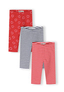 Three girls' capri leggings in red with heart print, navy and white stripes, and pink and red striped design.
