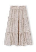 Cream floral maxi skirt for girls with elastic waistband and tiered ruffle design for ages 3 to 15 years.