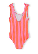Girls striped swimsuit in pink coral with adjustable shoulder straps tied in bows, featuring a playful design
