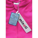 Pink textured rash suit with Minoti brand tags, UPF 50+ sun protection info.