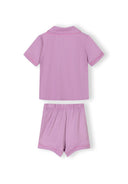 Girls soft pink short sleeve pajama set with breathable fabric and heart design accents for kids aged 3-15 years