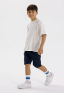 Boys casual combat shorts elasticated waistband navy 1-14y, featuring a relaxed fit, elasticated waistband, and side pockets.