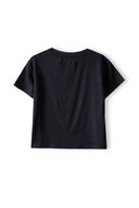 Girls cropped oversized top black 3-14y with drop shoulder short sleeves and lightweight fabric for casual wear. 