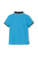 Boys polo shirt with contrast tipping turquoise 1-8y. Vibrant turquoise cotton pique fabric with navy collar and green accents. 