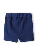 Turquoise boys polo shirt and short set contrast details turquoise 3m-3y featuring elasticated waistband shorts.