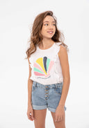 Girls denim shorts neon sequined pocket navy 3-14y paired with a ruffled white tank top featuring a colorful design. Comfortable and stylish.