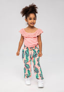Girls off the shoulder top broiderie anglaise coral 3-14y with frill trim, paired with tropical leaf printed pants. Perfect for warm weather.