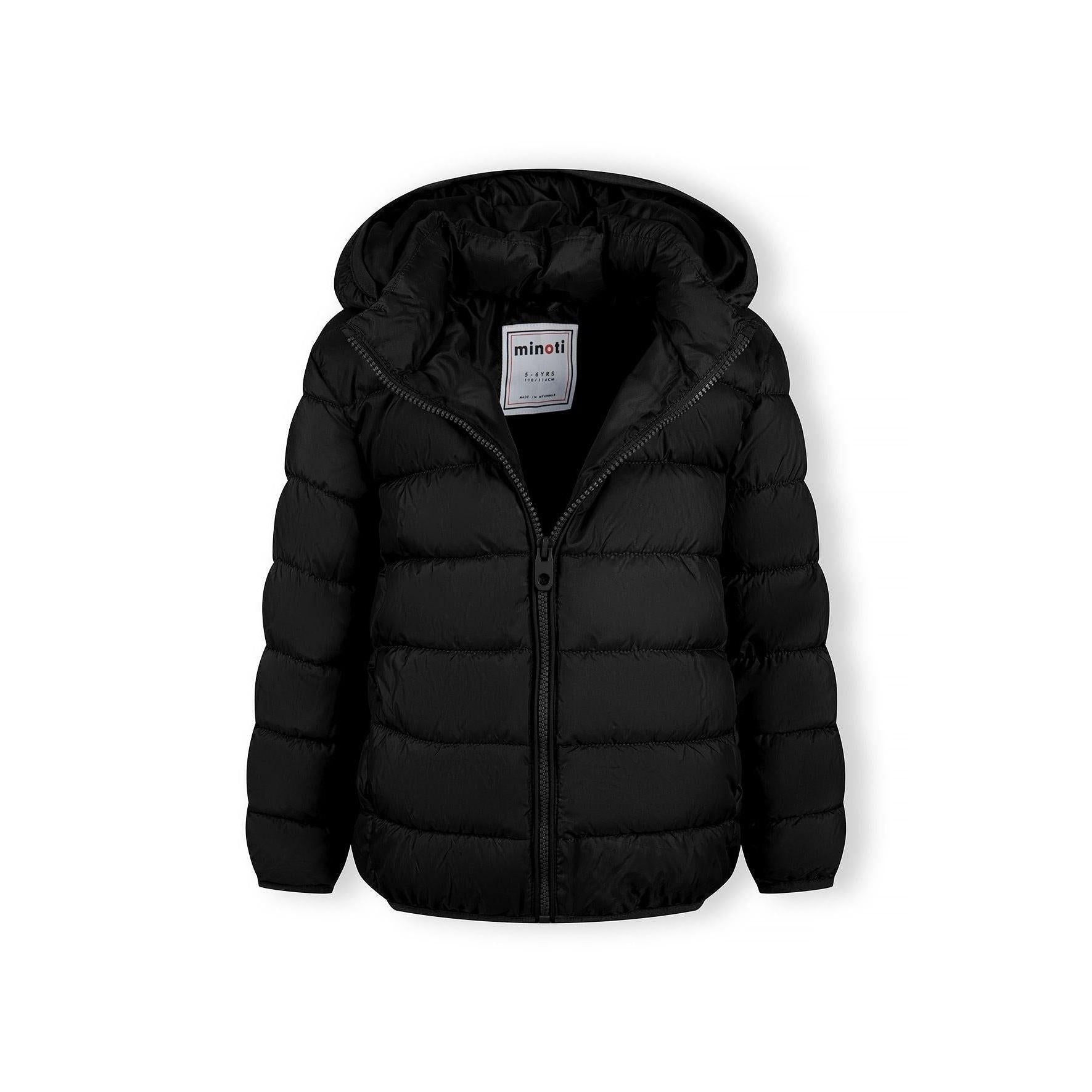 Detail view of black quilted jacket sleeve showing padded construction and embossed circular Minoti logo patch