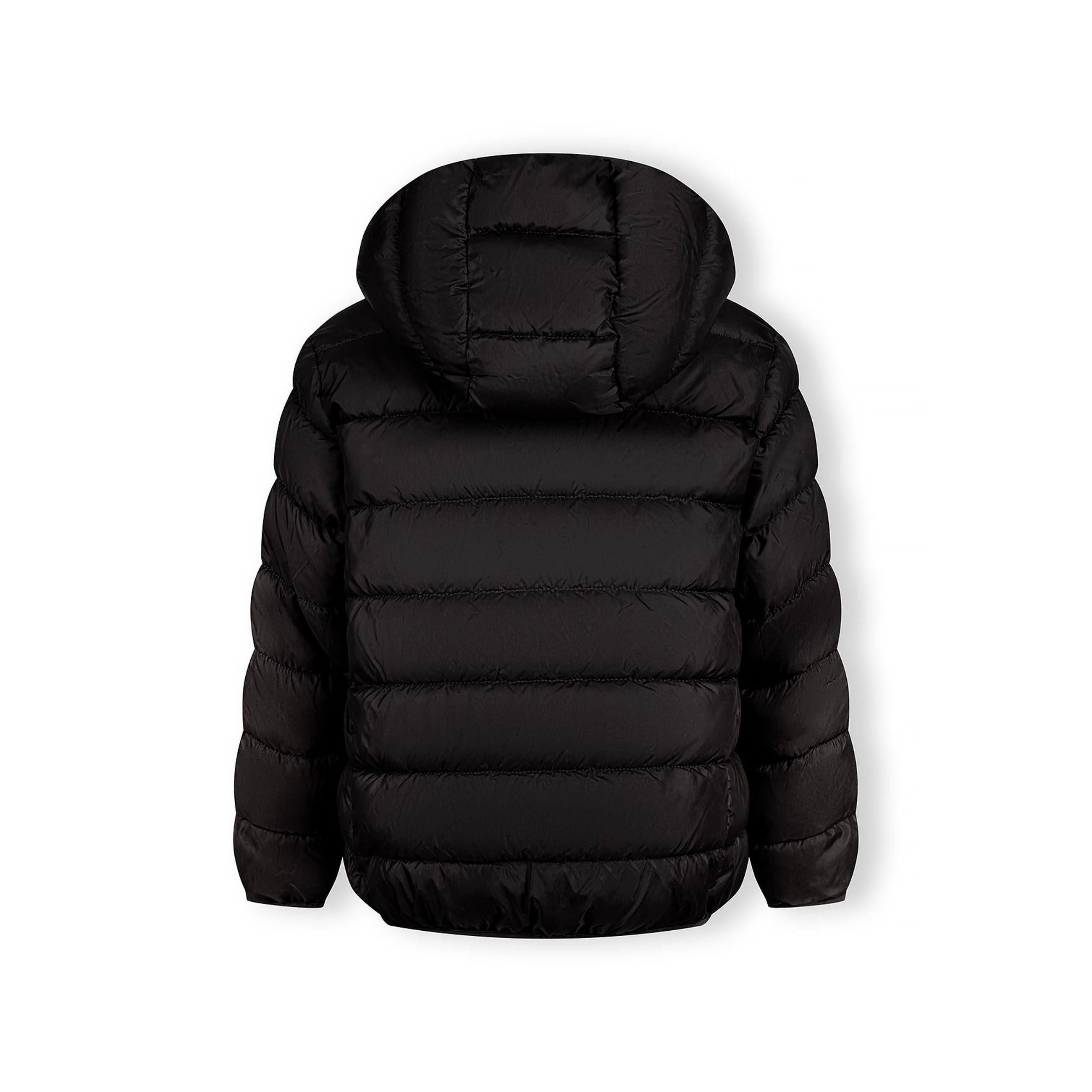 Detail view of black quilted jacket sleeve showing padded construction and embossed circular Minoti logo patch