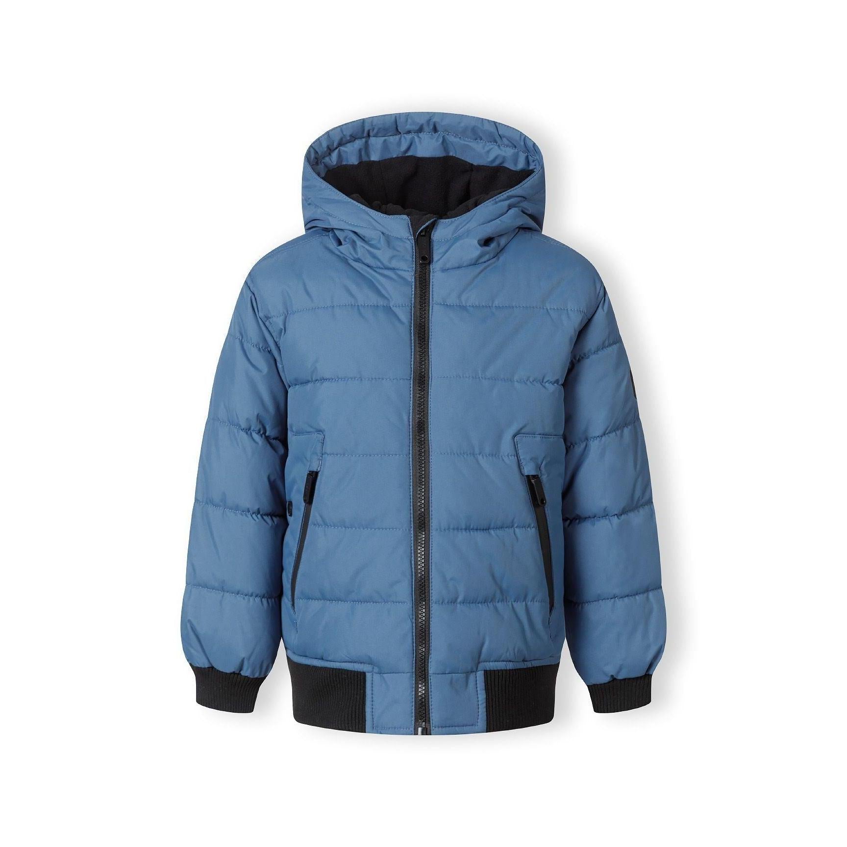 Same young boy in blue padded jacket, front view showing hood and zip closure detail