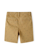 Boys chino shorts in tan with subtle embroidered pattern and turn-up hems