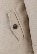 Boys beige wool coat pocket with button fastening closure