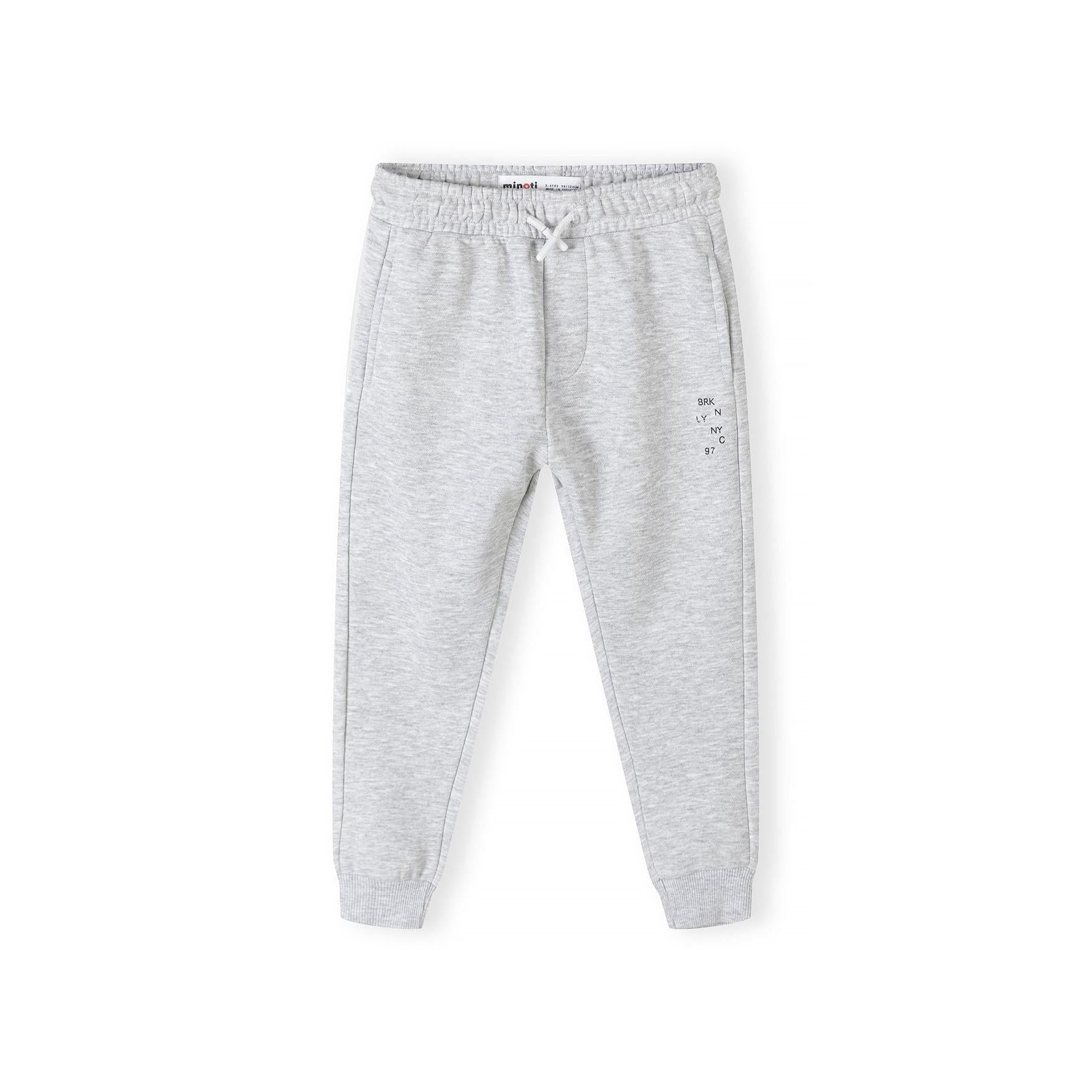 Grey melange fleece joggers with Brooklyn print detail on front leg, elasticated waistband with drawstring, ribbed ankle cuffs, displayed flat against white background