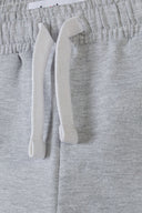 Boys navy t-shirt with gray heathered fleece shorts and white drawstrings