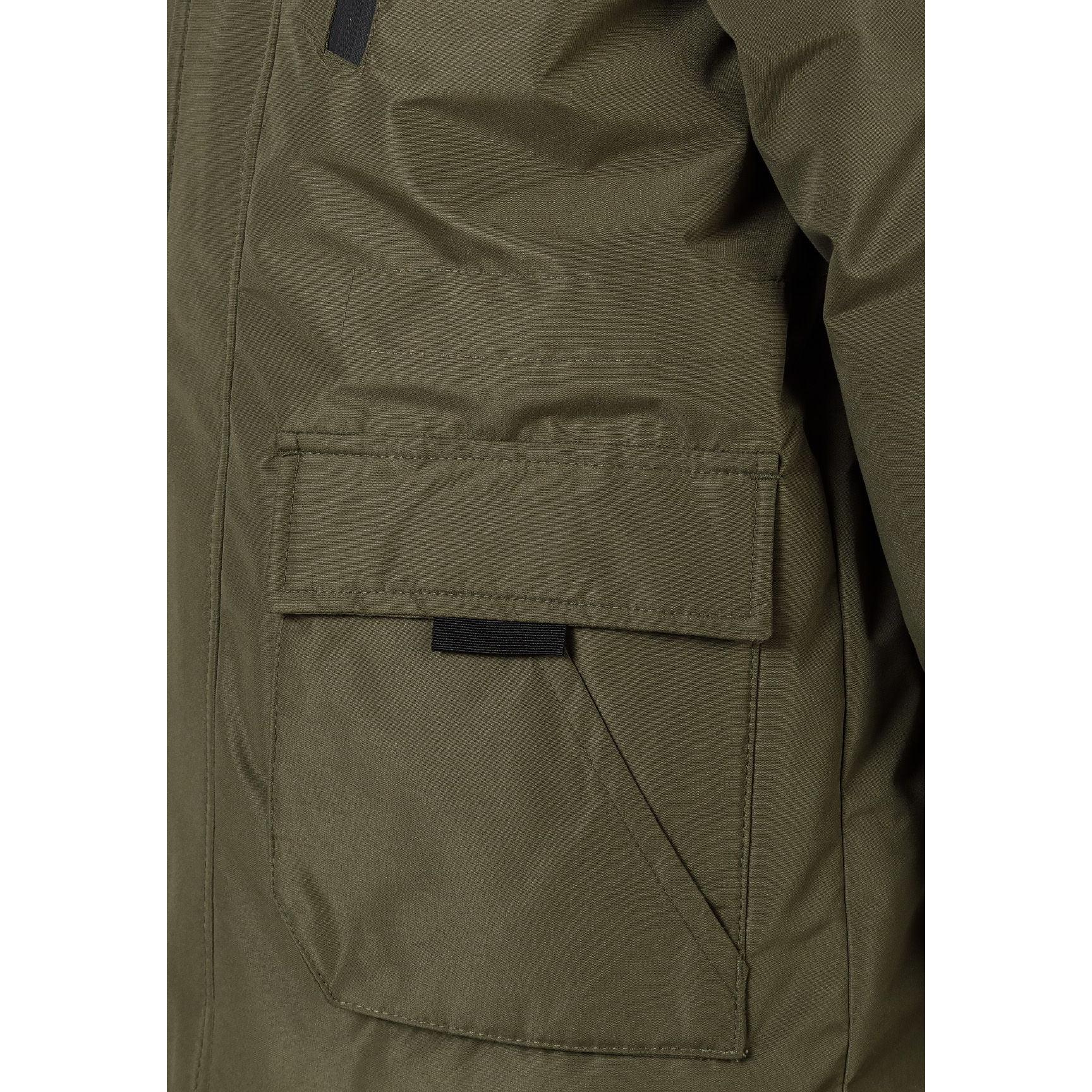 Close-up detail of khaki jacket back showing EST. 1997 white text print across hood area