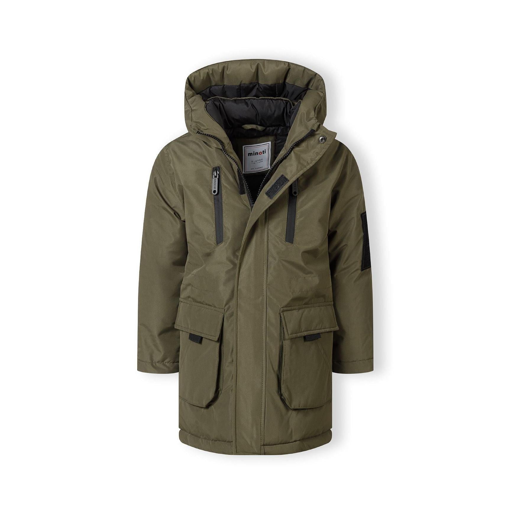 Close-up detail of khaki jacket back showing EST. 1997 white text print across hood area