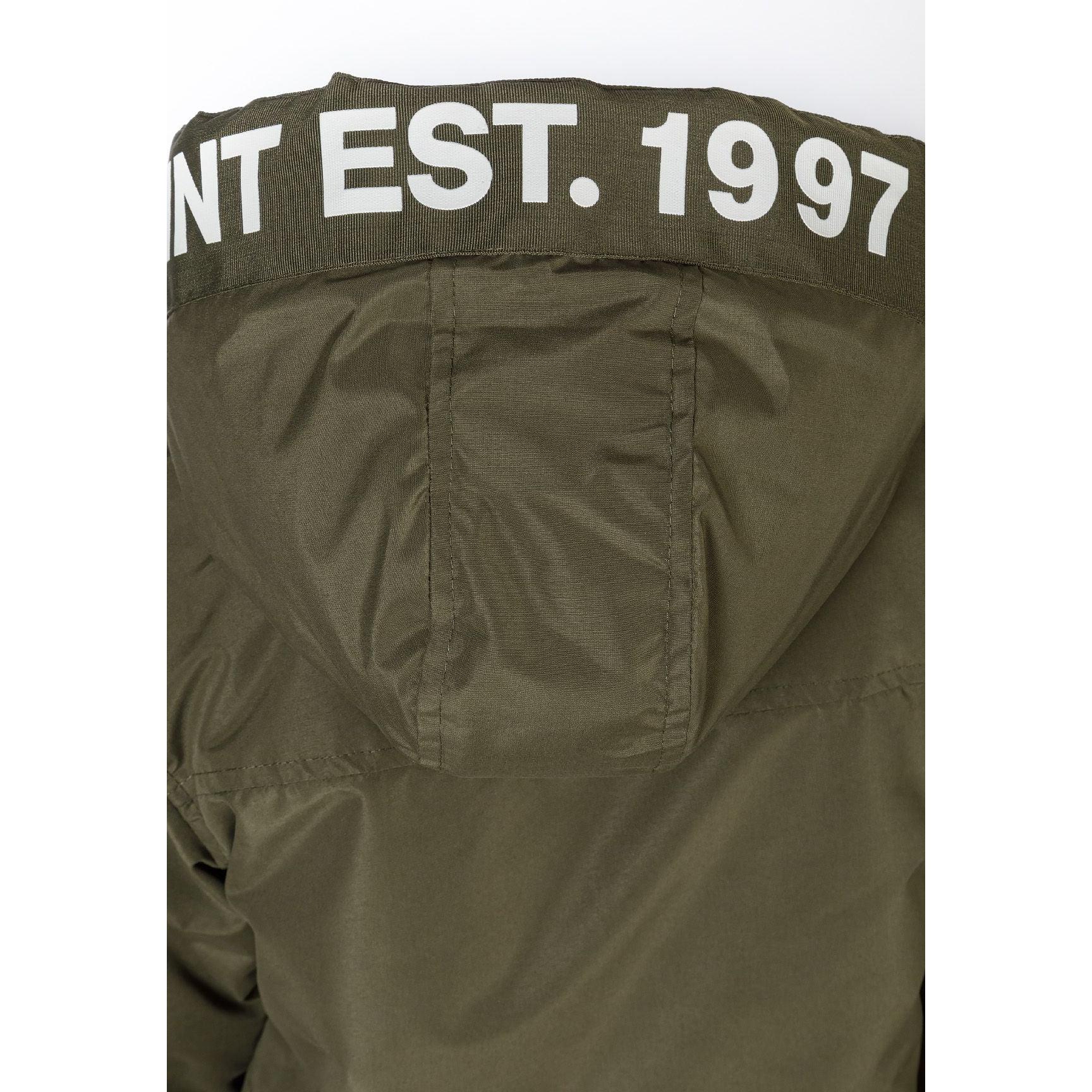 Close-up detail of khaki jacket back showing EST. 1997 white text print across hood area