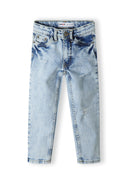 Boys ripped denim jeans in light wash faded blue with distressed rips