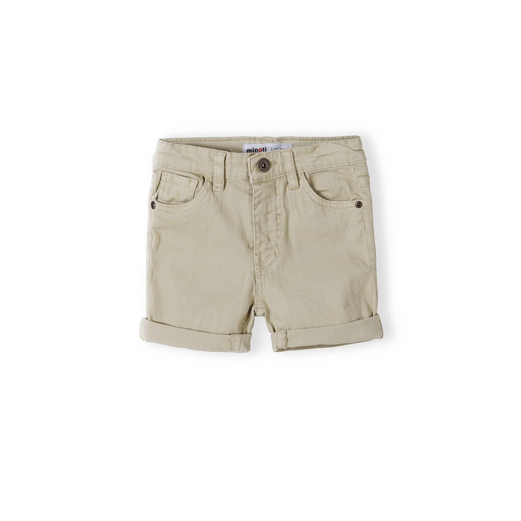 Back view of beige twill shorts showing five pocket design with brown leather waistband label on white background