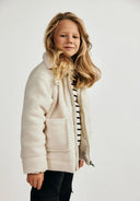 Cream-colored, plush fleece jacket with a cozy collar and front pockets.