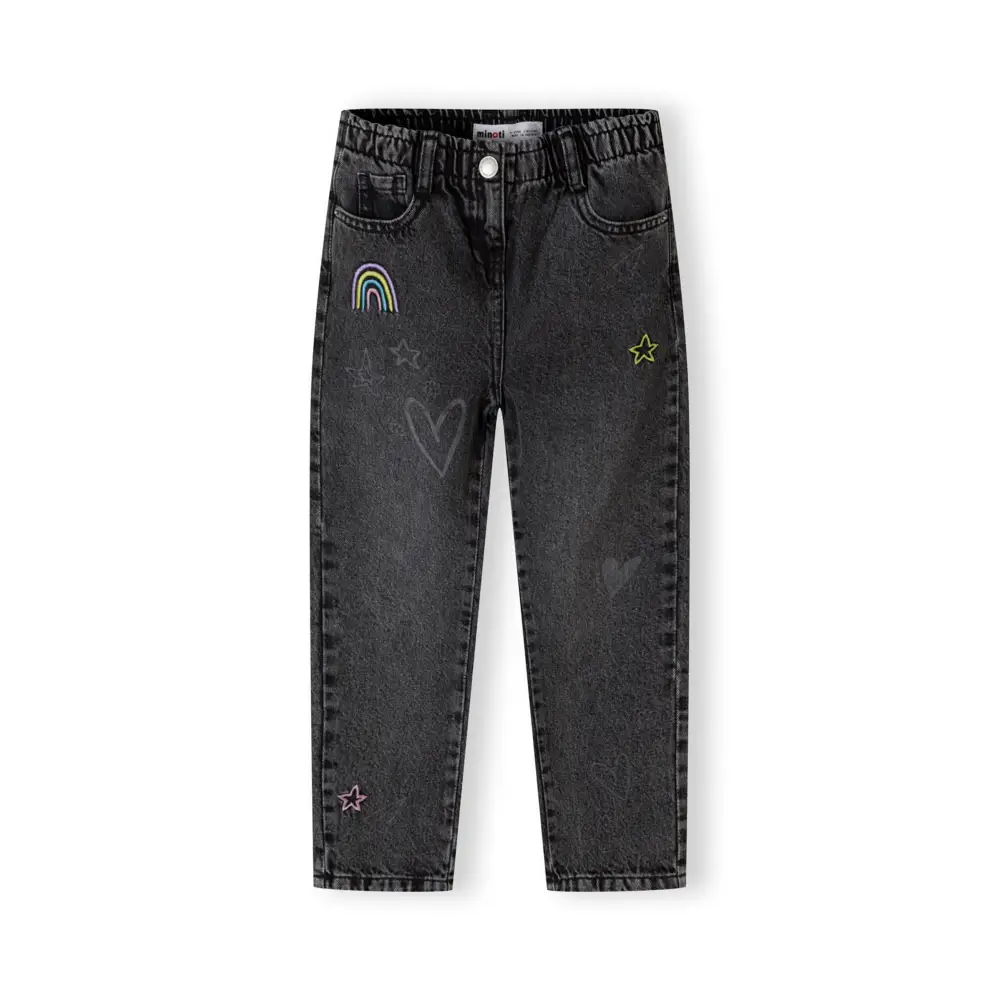 Black embroidered jeans laid flat showing back view with rainbow embroidery on right pocket and star detail on left pocket against white background