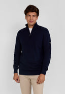Navy blue half zip jumper with ribbed cuffs and subtle logo