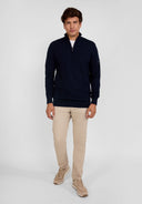 Navy blue half zip jumper with ribbed cuffs and subtle logo